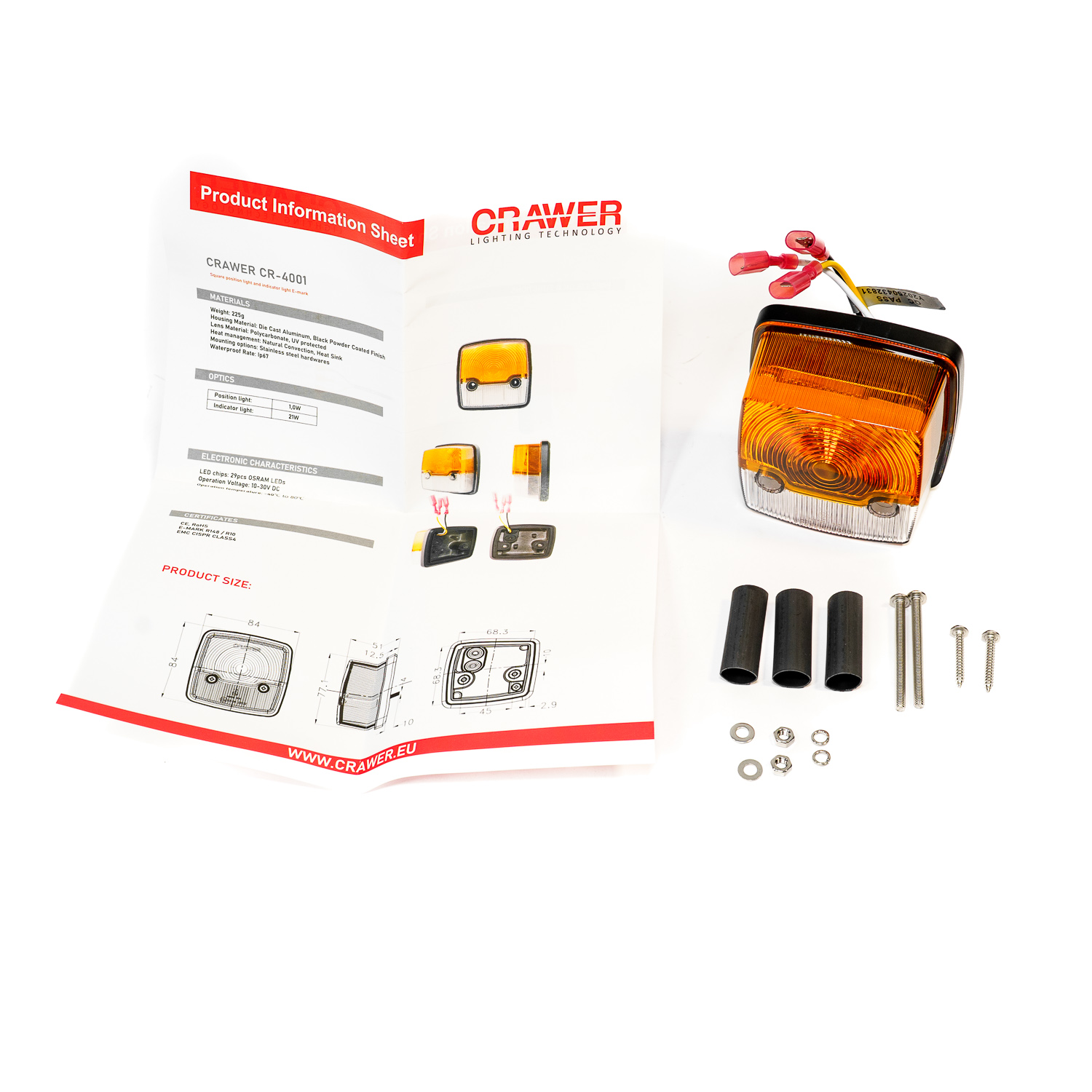 Feu combiné avec lentille orange et blanche à côté du manuel et du matériel de montage de CRAWER Lighting Technology